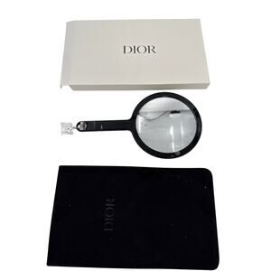 CDMG101: Christian Dior black handheld mirror with a case and presentation box